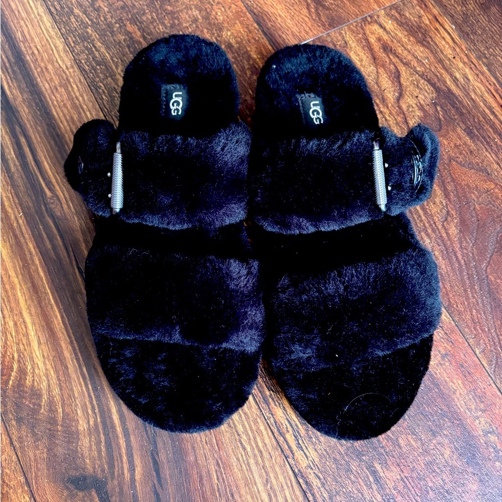 Black fluffy UGG sandals